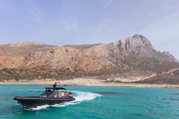 Sailing Cruise vs Private Cruises in Crete: Which Is right for you?. The image shows a private boat sailing to Balos. 