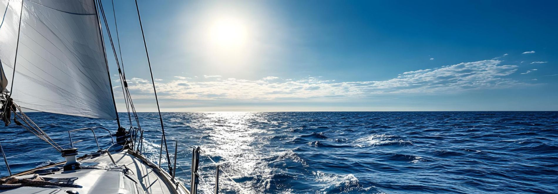 Top sailing destinations in Crete you can visit by boat. The image shows a boat sailing on the sea.