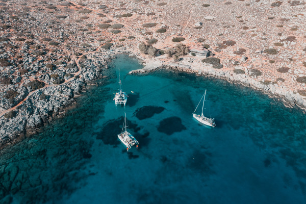 Top sailing destinations in Crete you can visit by boat. The image shows the island of Dia.